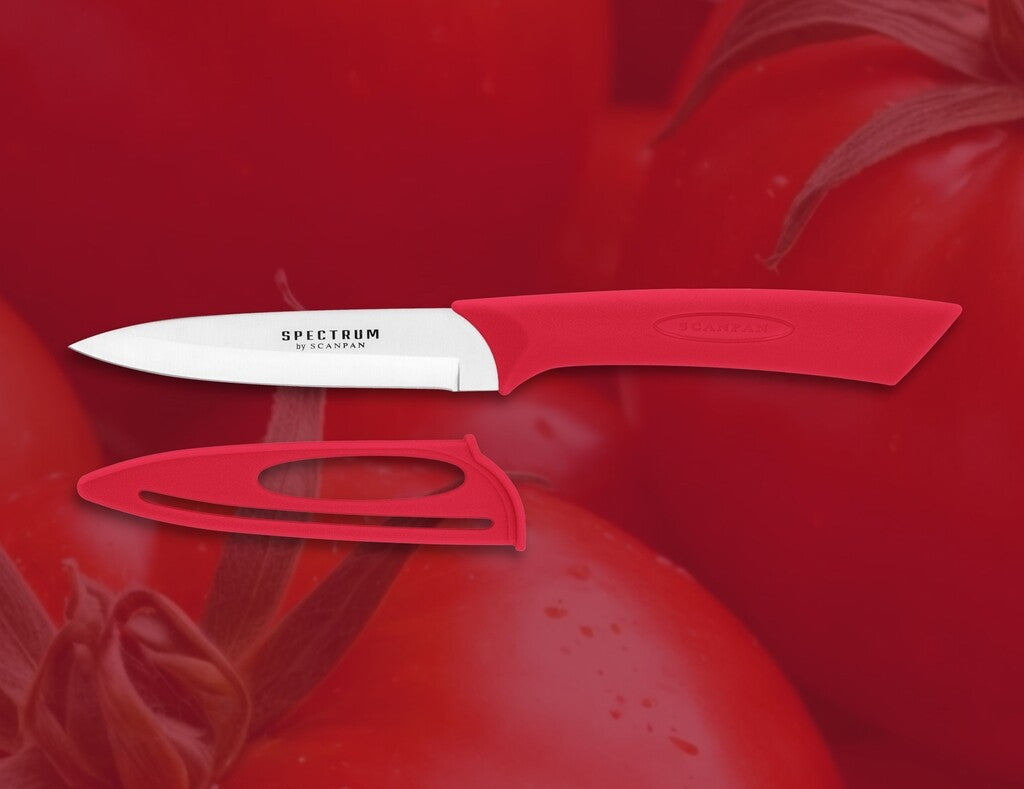 Spectrum vegetable knife in Red on a white background