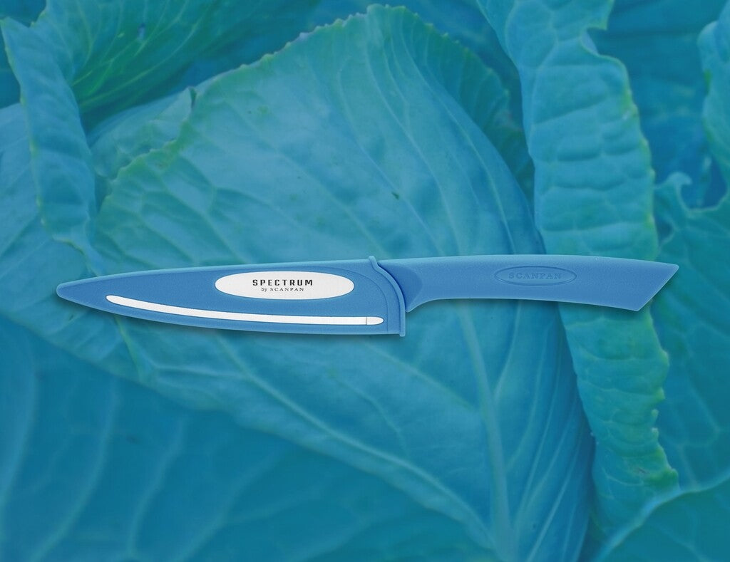 Spectrum utility knife in Silver Lake Blue shown in use
