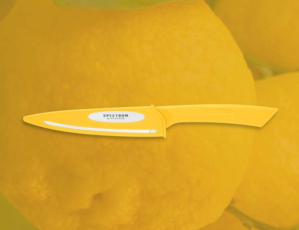 Spectrum utility knife in Sunstruck shown in use