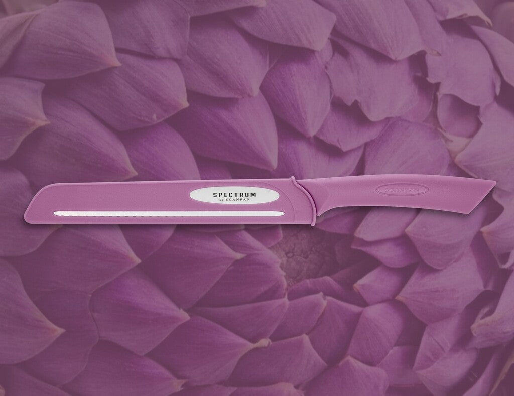Spectrum bread knife in Dusty Lavender shown in use