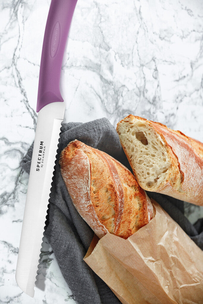 Spectrum bread knife in Dusty Lavender on a white background